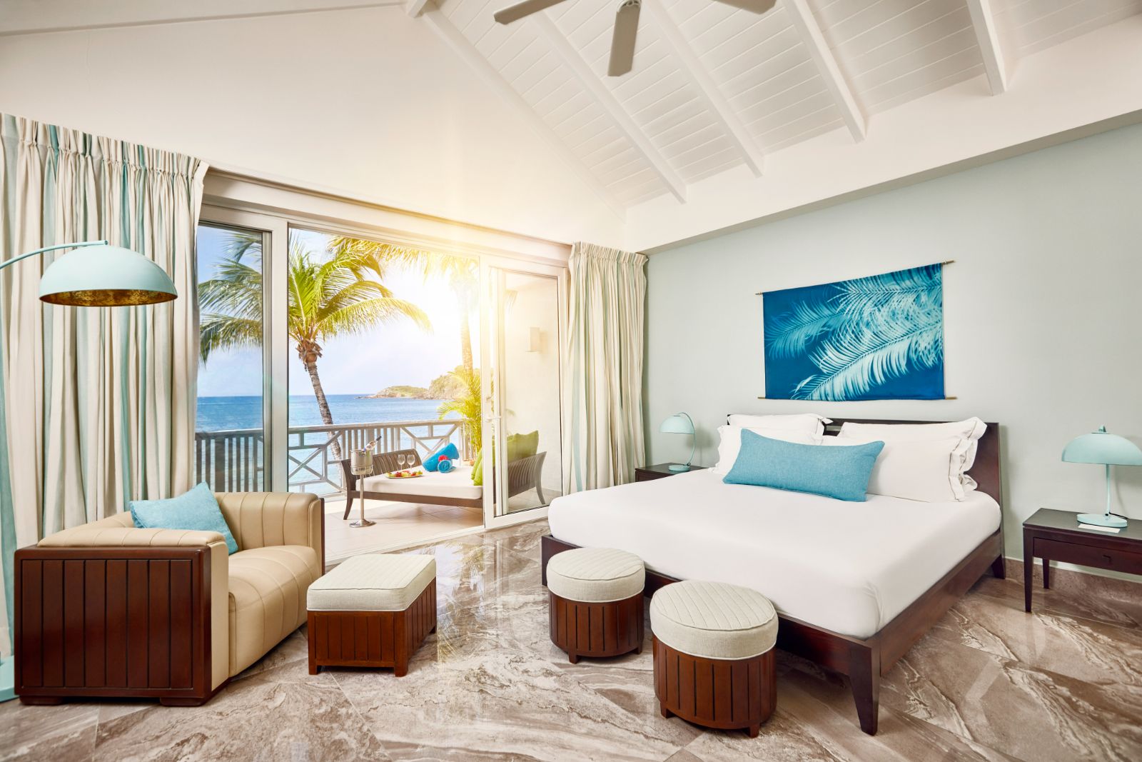 Beach Balcony Suite bedroom at Carlisle Bay in Antigua