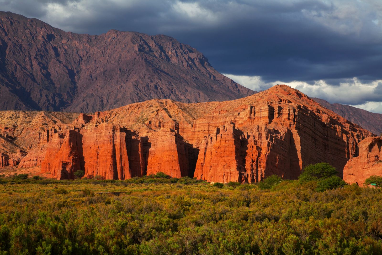 Towering brick red rock formation in Cafayate, Central Argentina