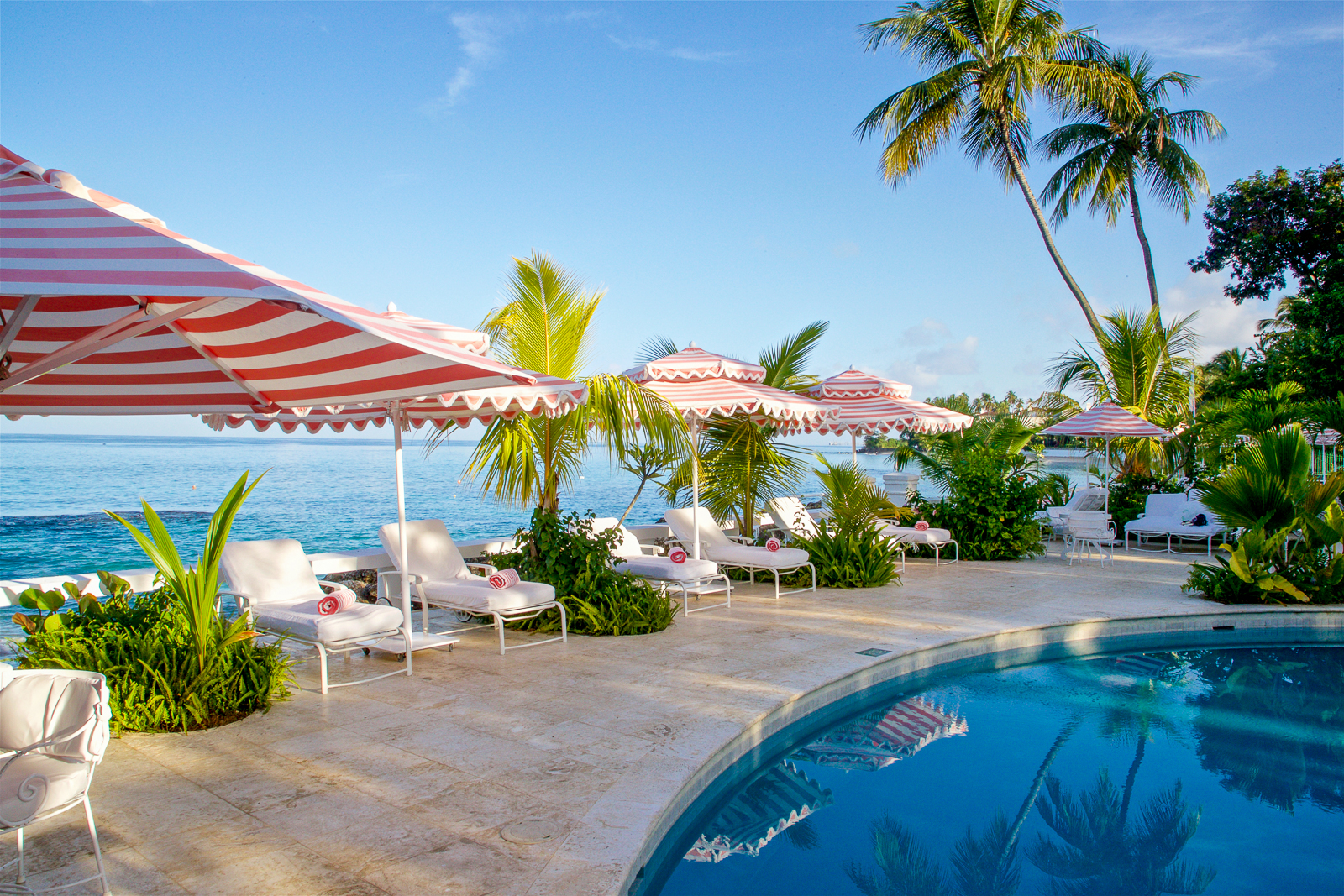 Loungers by the pool at Cobbler's Cove in Barbados