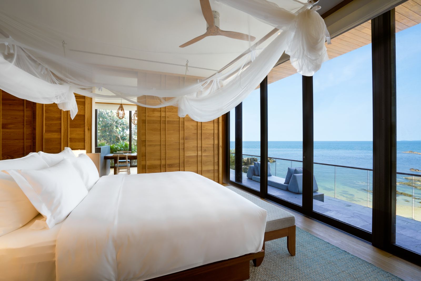 Bedroom with sea view in The Beach Retreat at Luxury Resort Six Senses Krabey