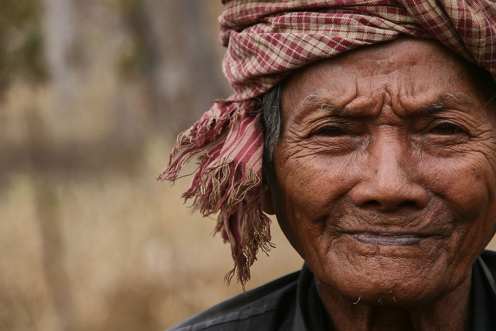 Close up profile of an elderly Cambodian man