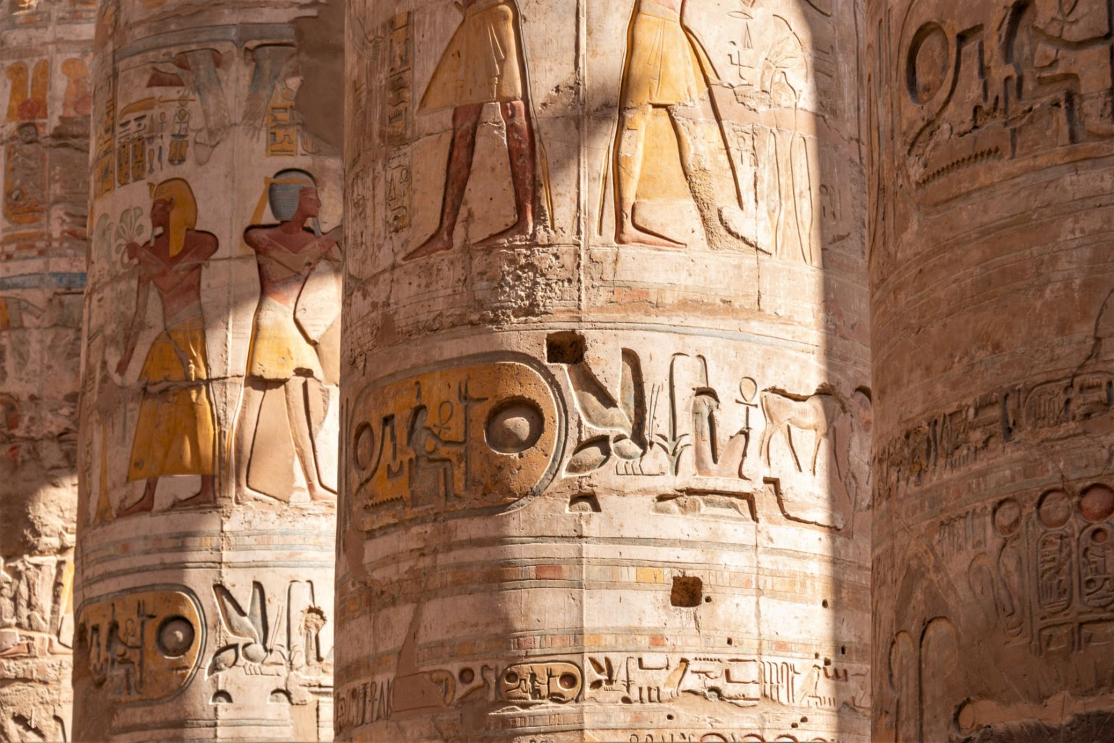 Hieroglyphs on the pillars of Karnak temple in Egypt