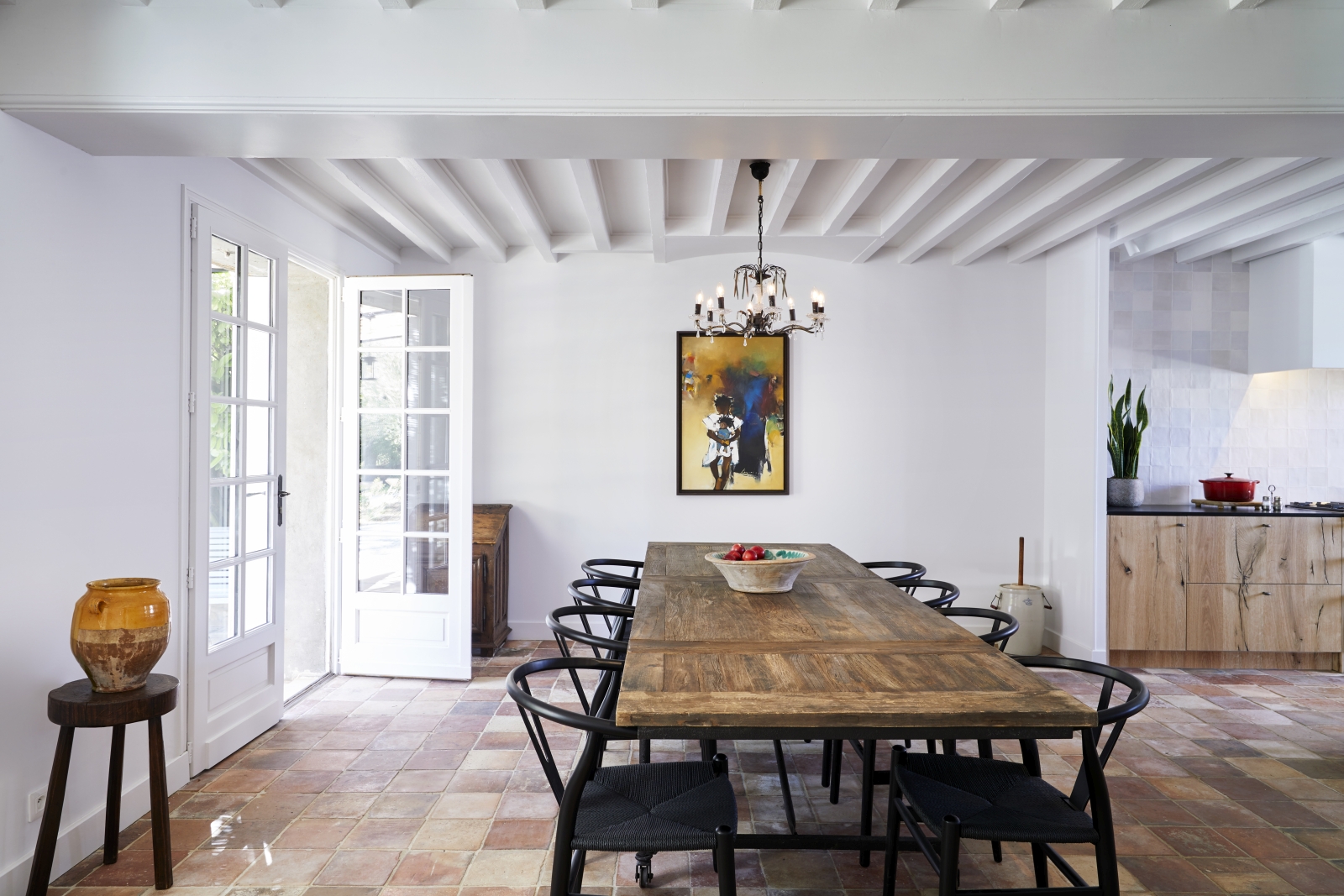 dining room with long wooden table at pomiera, france