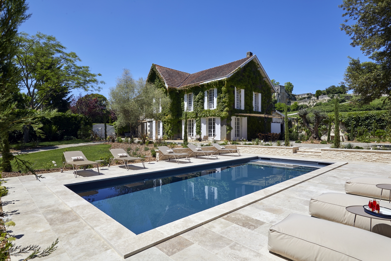 pool with the villa in the background at pomiera, france