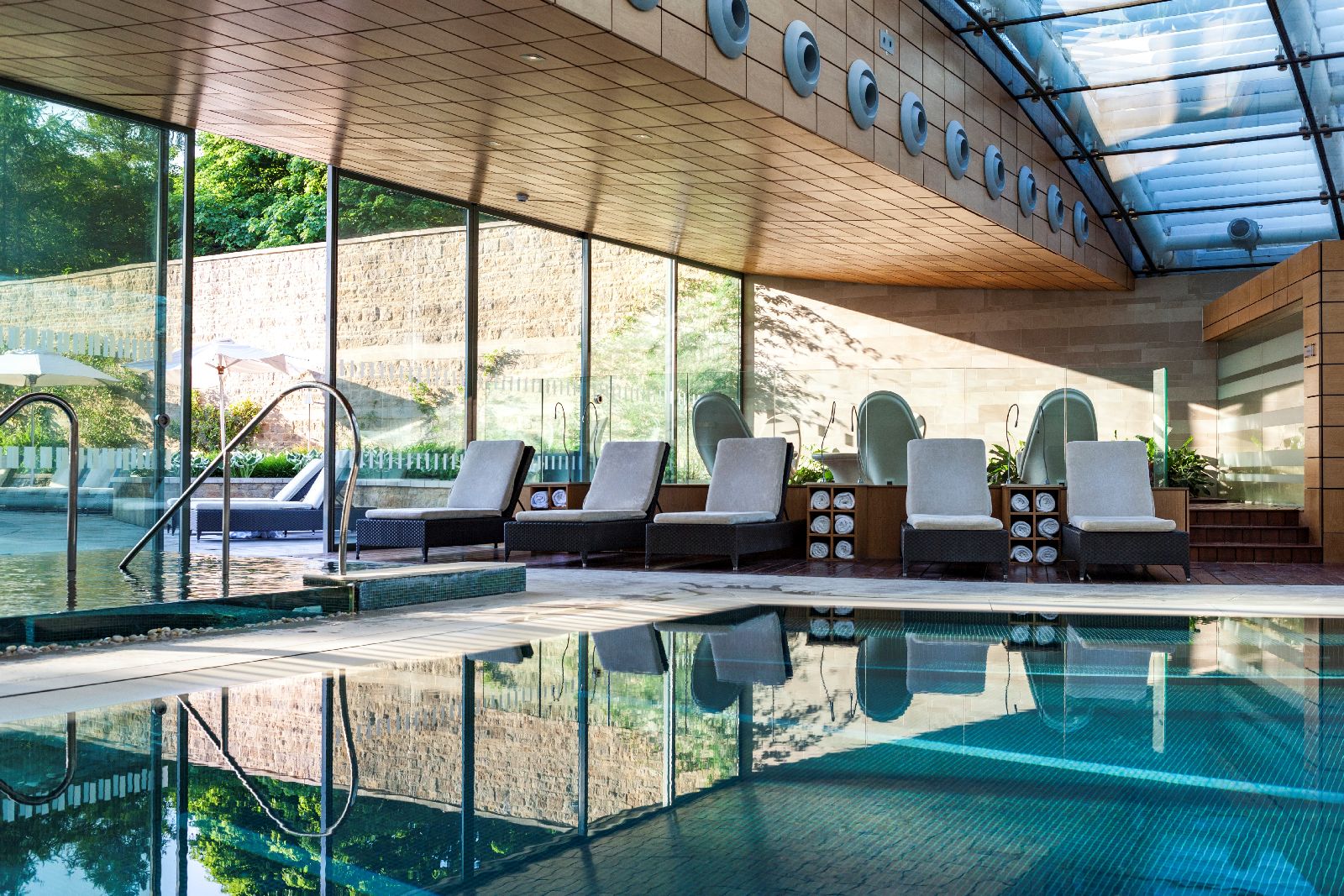 Indoor pool in the spa complex at Lucknam Park hotel in the Cotswolds England
