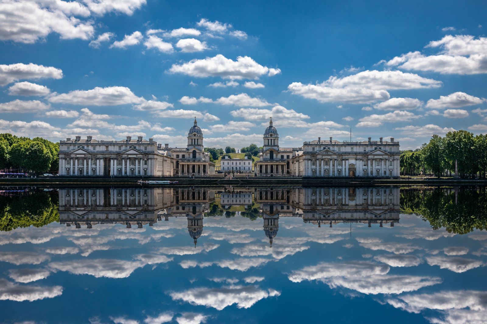 Reflections on the water outside Greenwich Naval College in Great Britain