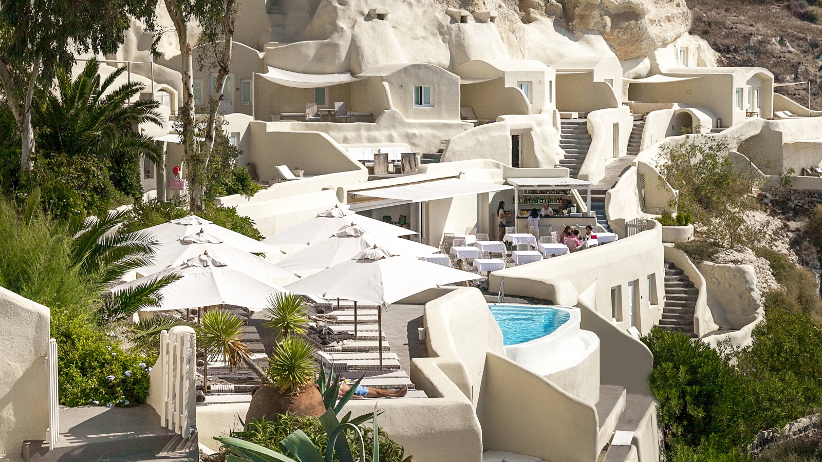 View over the restaurant and pool at Mystique in Santorini Greece