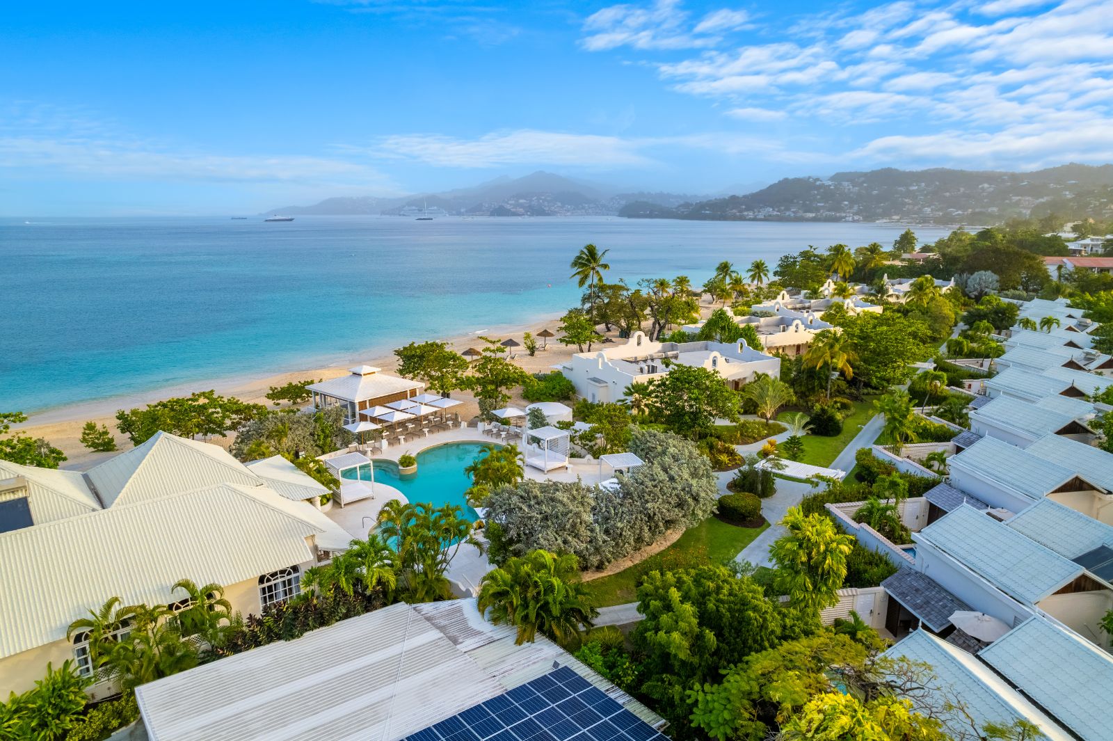 Aerial view of the pool and beach at Spice Island Beach Resort in Grenada