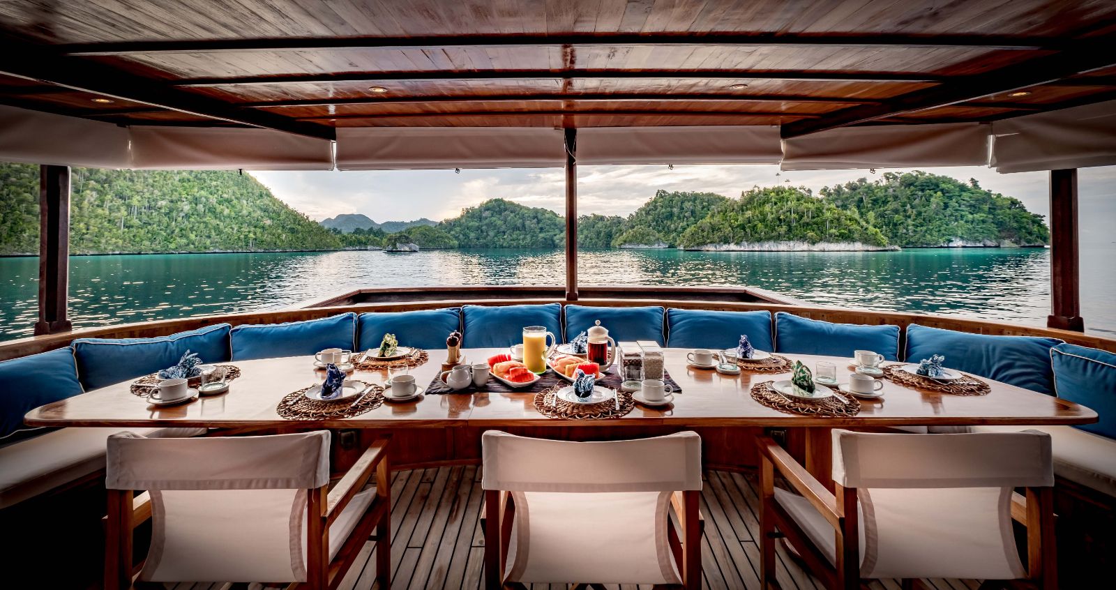 Outdoor dining set up on Luxury Yacht Rascal