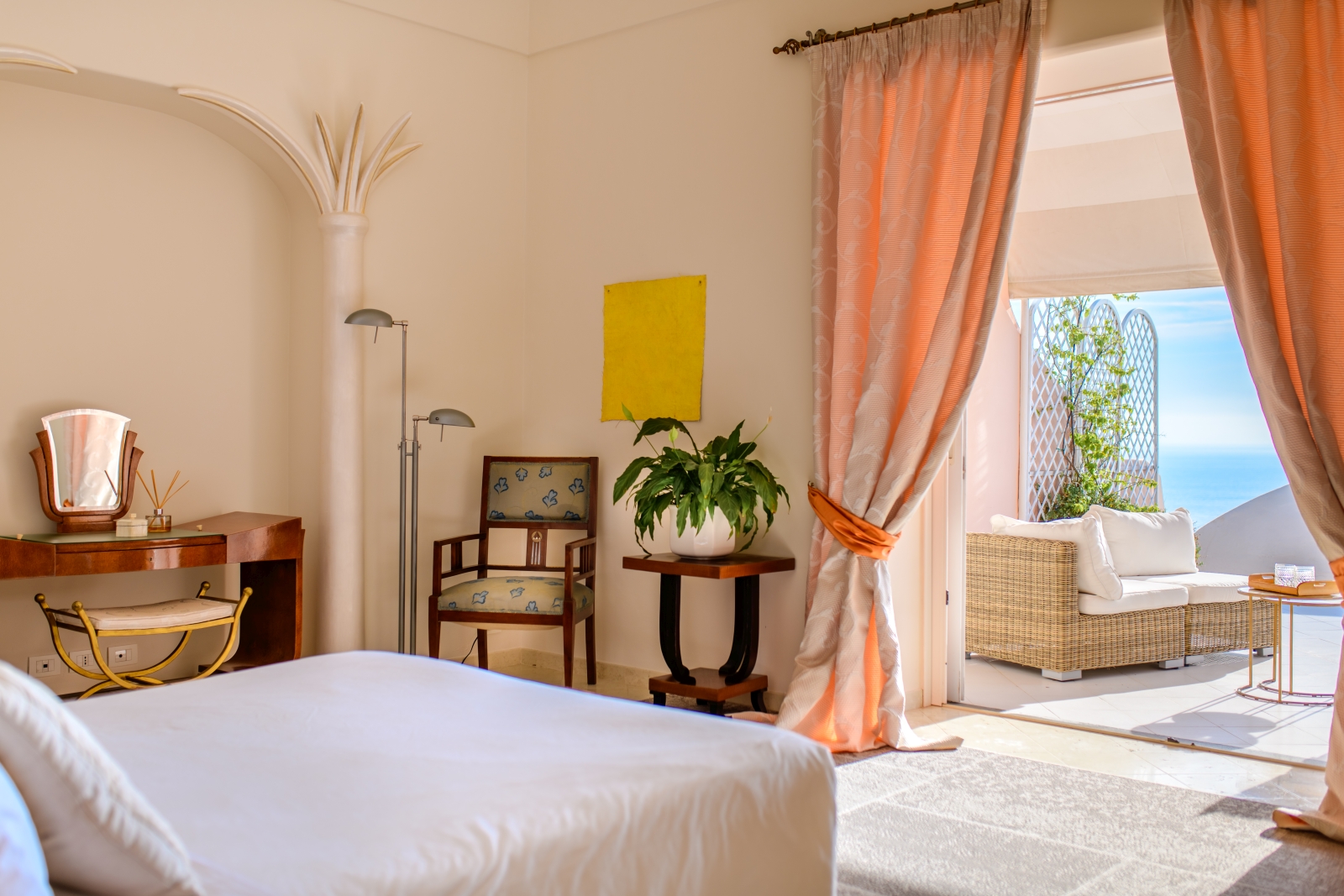 Double bedroom with door onto terrace at Villa Contralto in Amalfi