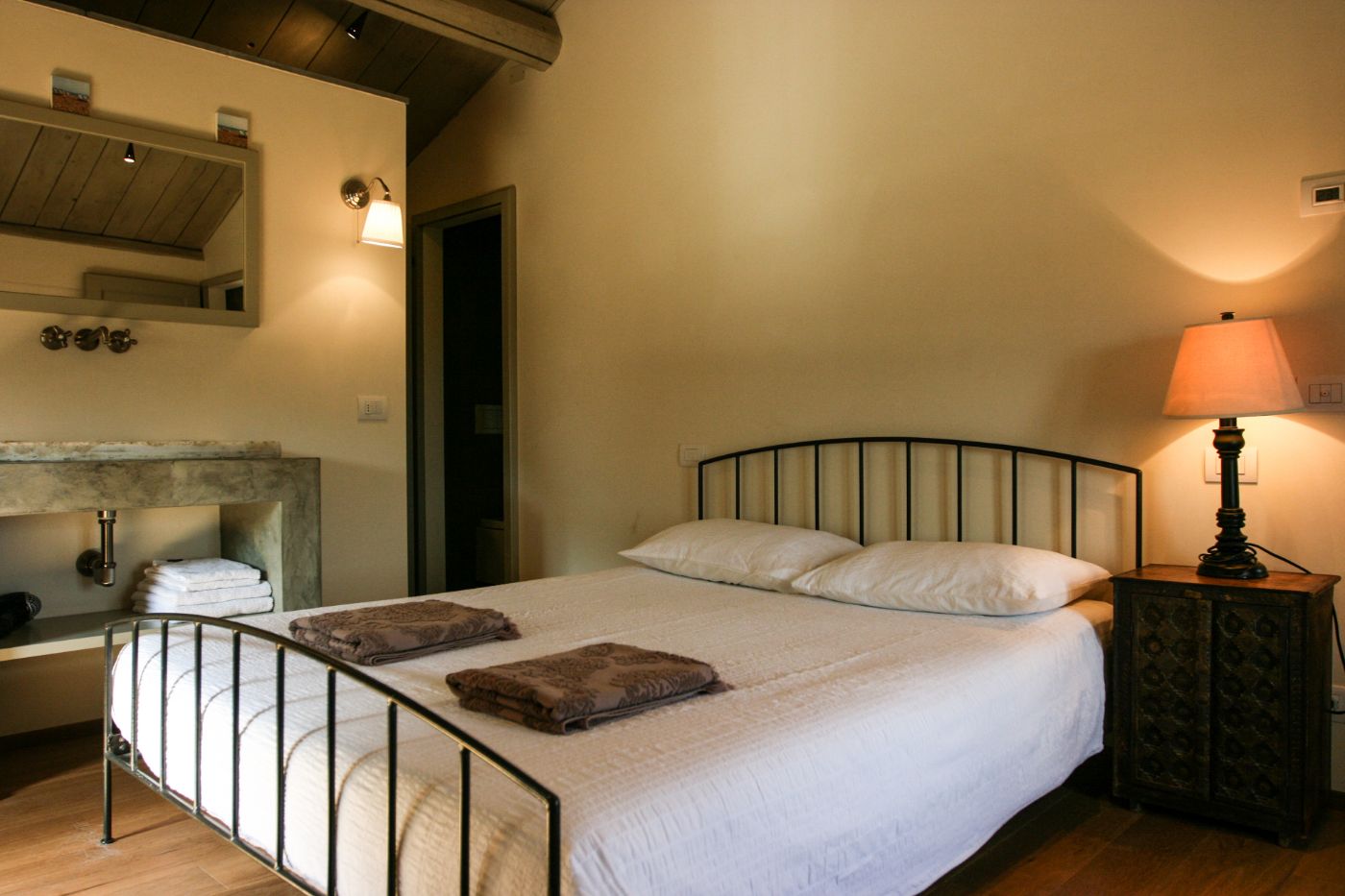 A King-sized bed in the second bedroom of La Spighetta.