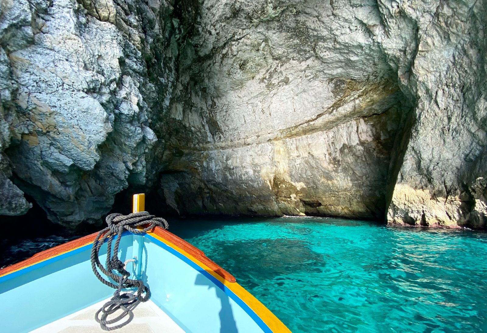 Boat entering the Blue Grotto in Malta
