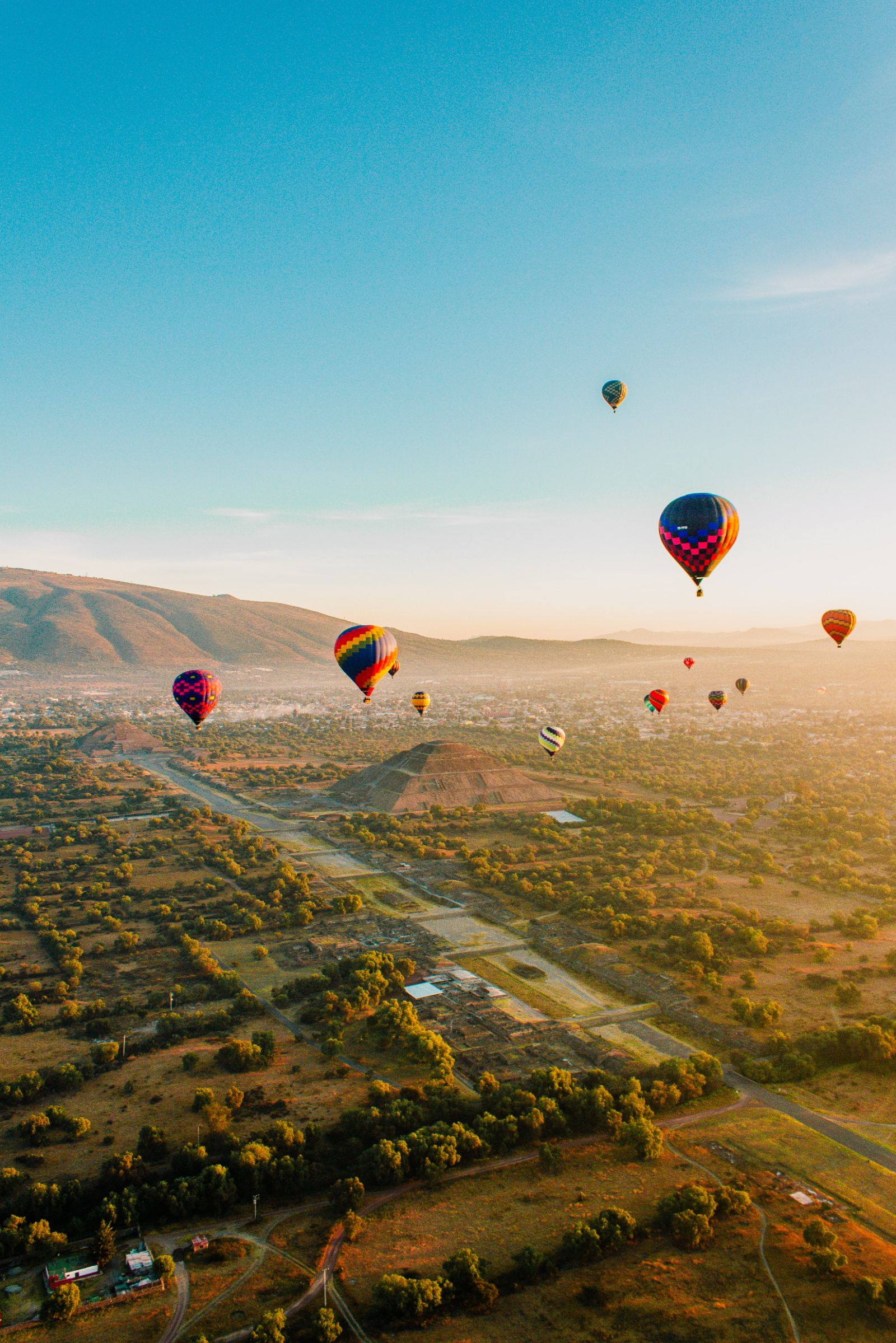 Hot air balloons over the Teotihuacan ruins in Mexico