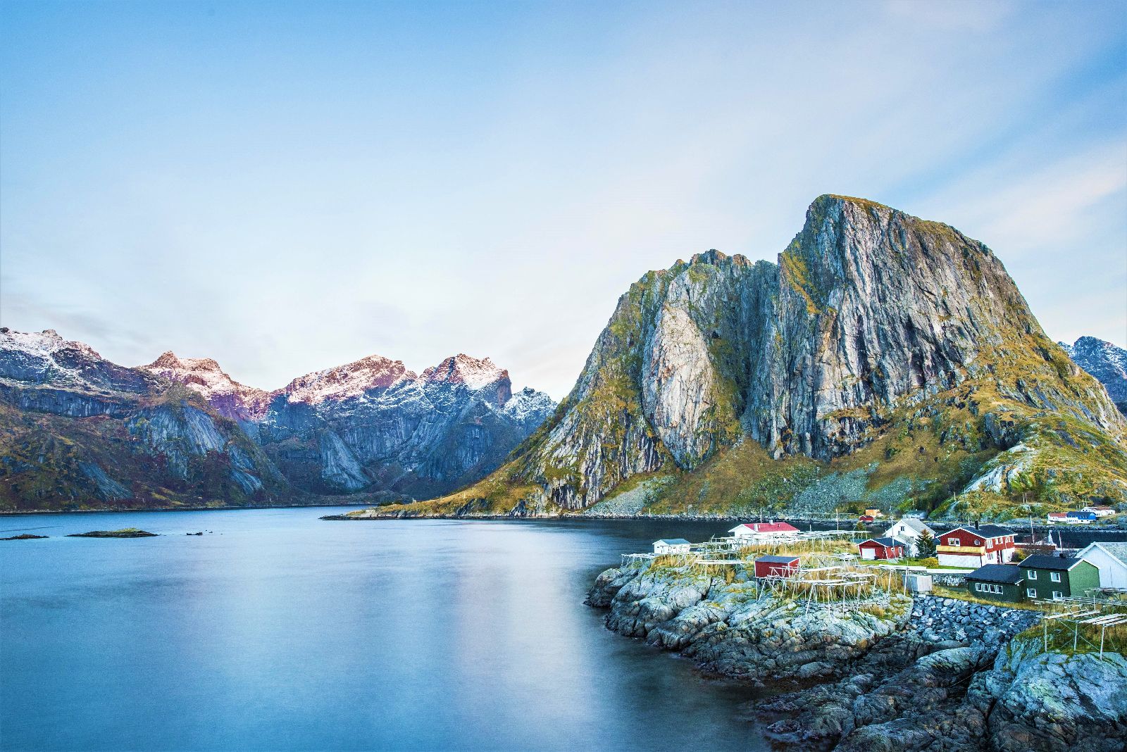 Dramatic view of small town in the shadow of a mountain in Norway's Lofoten Islands