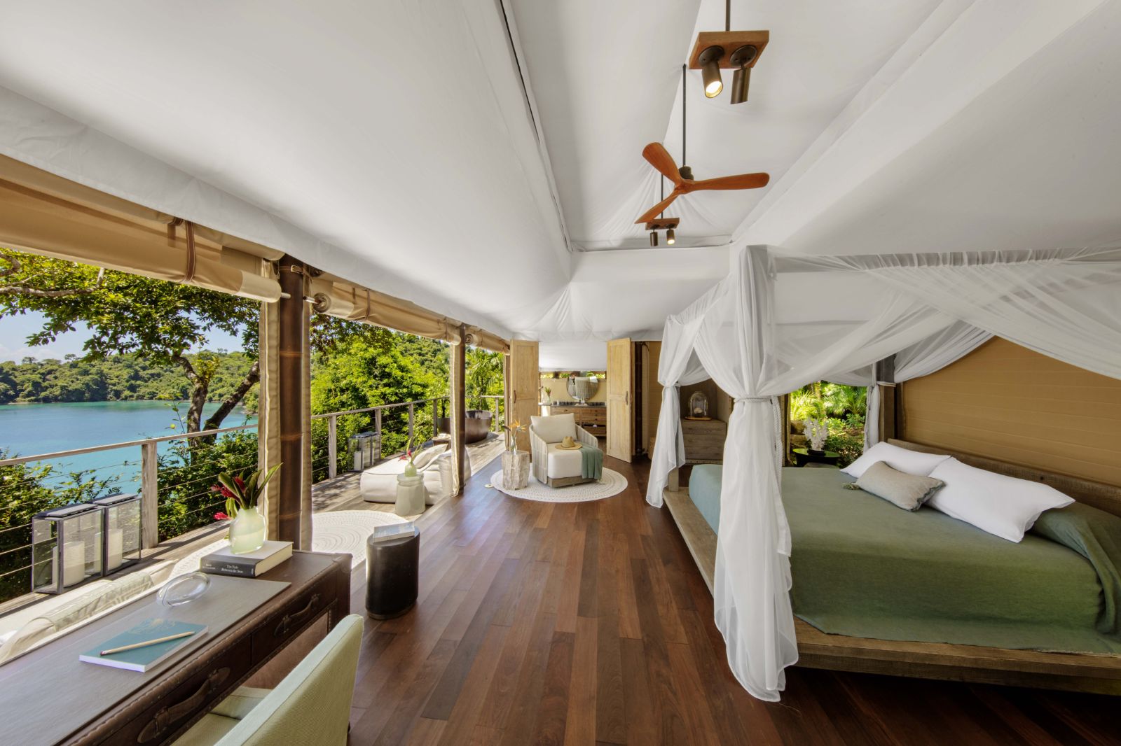 A tented guest suite bedroom at Islas Secas resort in Panama