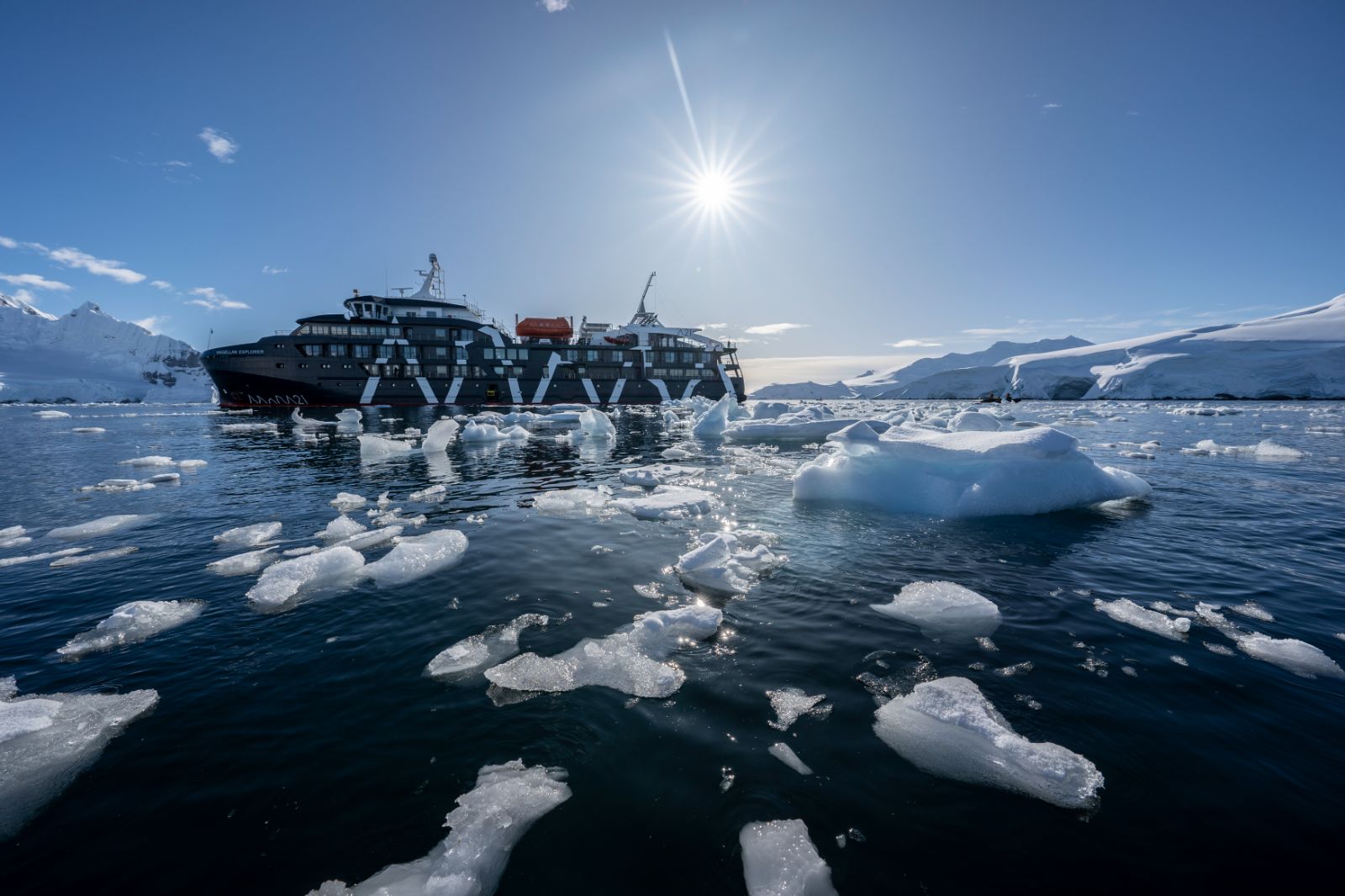 The Magellan Explorer in Antarctica surrounded by floating ice
