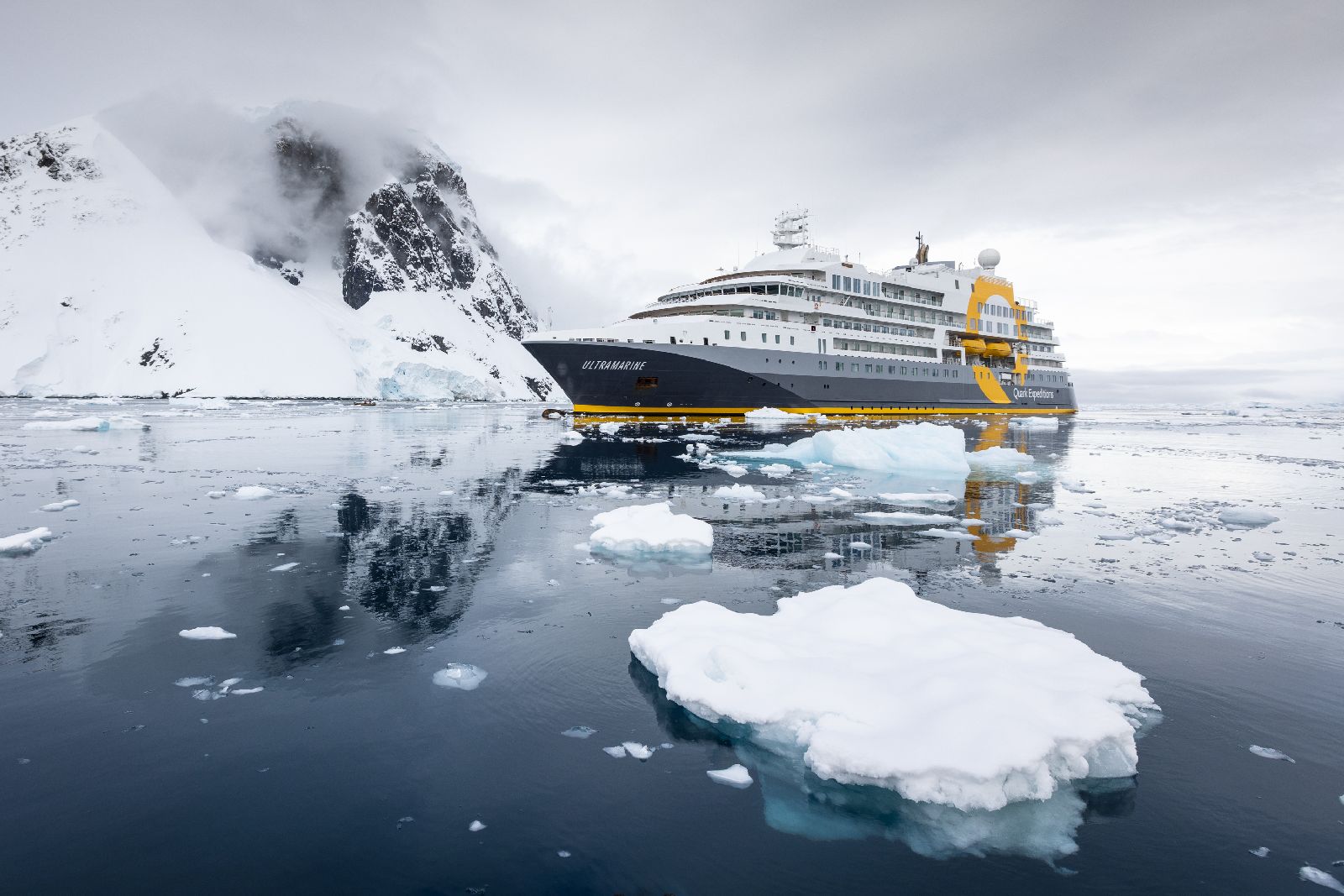 The Ultramarine cruise ship saling through ice in Antarctica