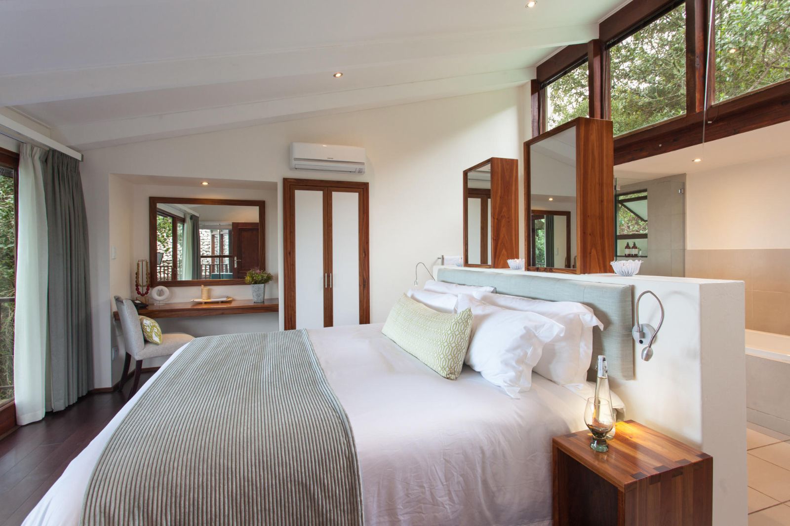 Garden suite bedroom with garden view at luxury lodge Grootbos Garden Lodge in South Africa