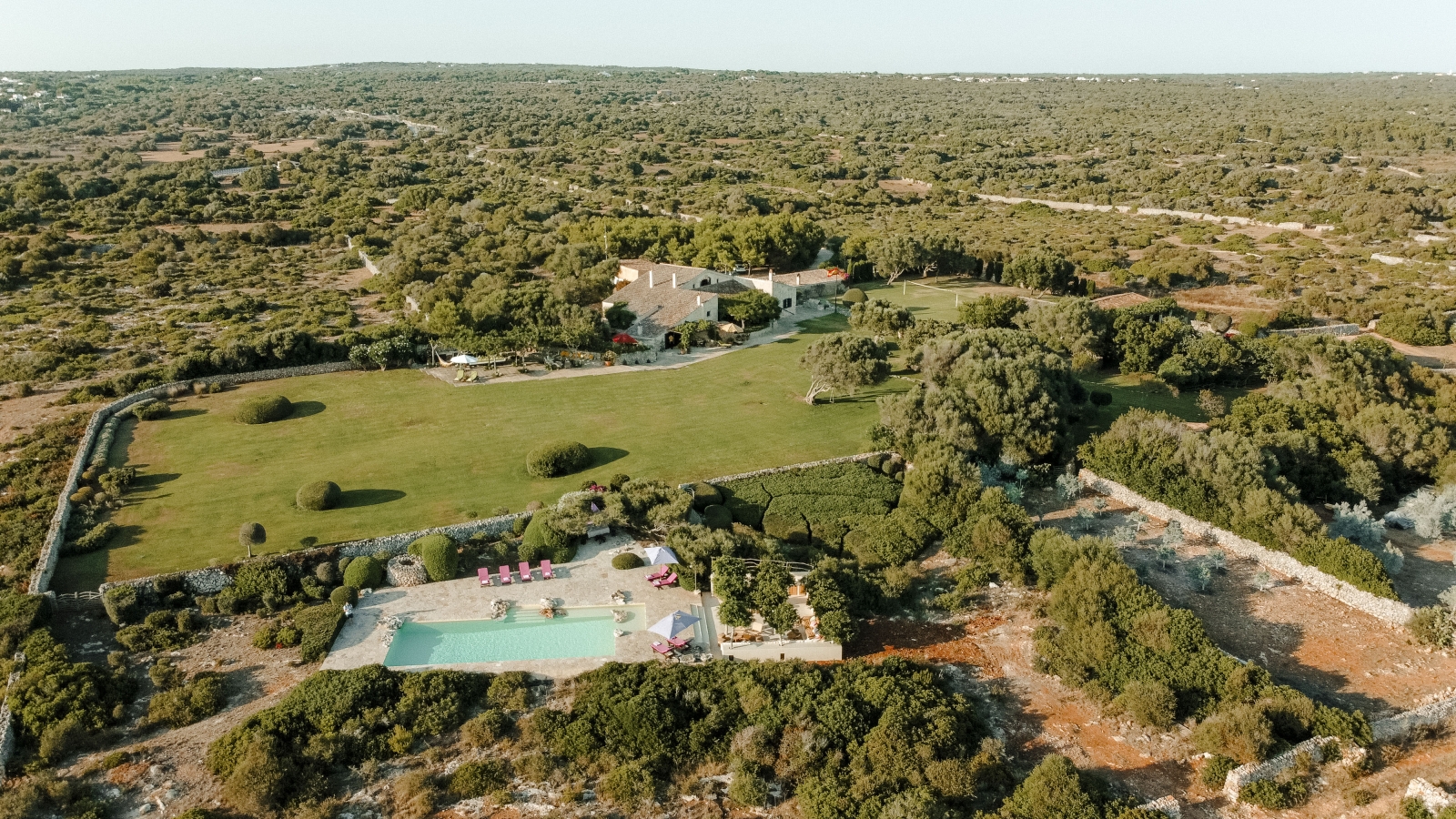 Aerial view of house and pool of Binicalaf, luxury villa in Menorca
