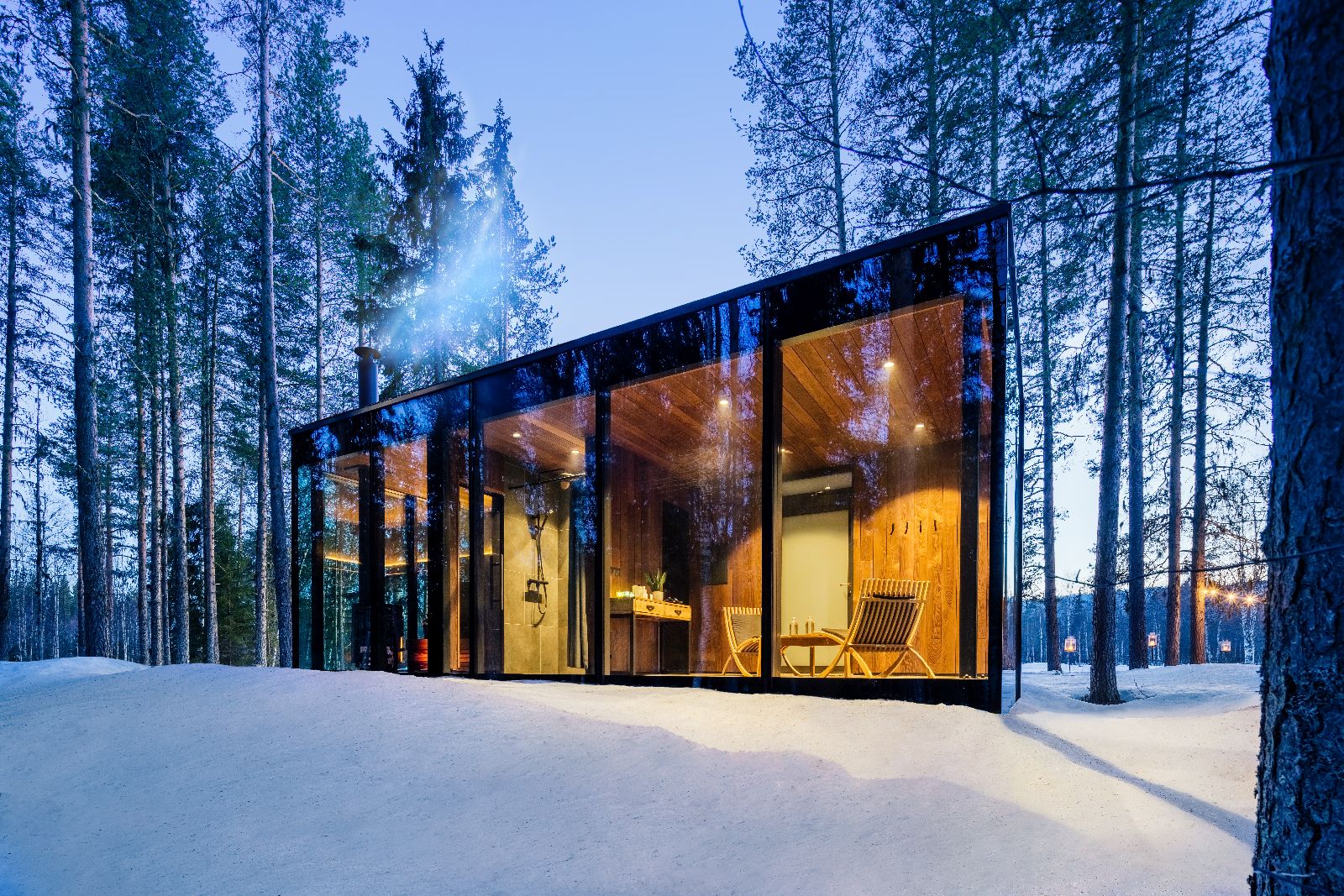 Private sauna with forest views at Loggers Lodge, luxury lodge in Swedish Lapland