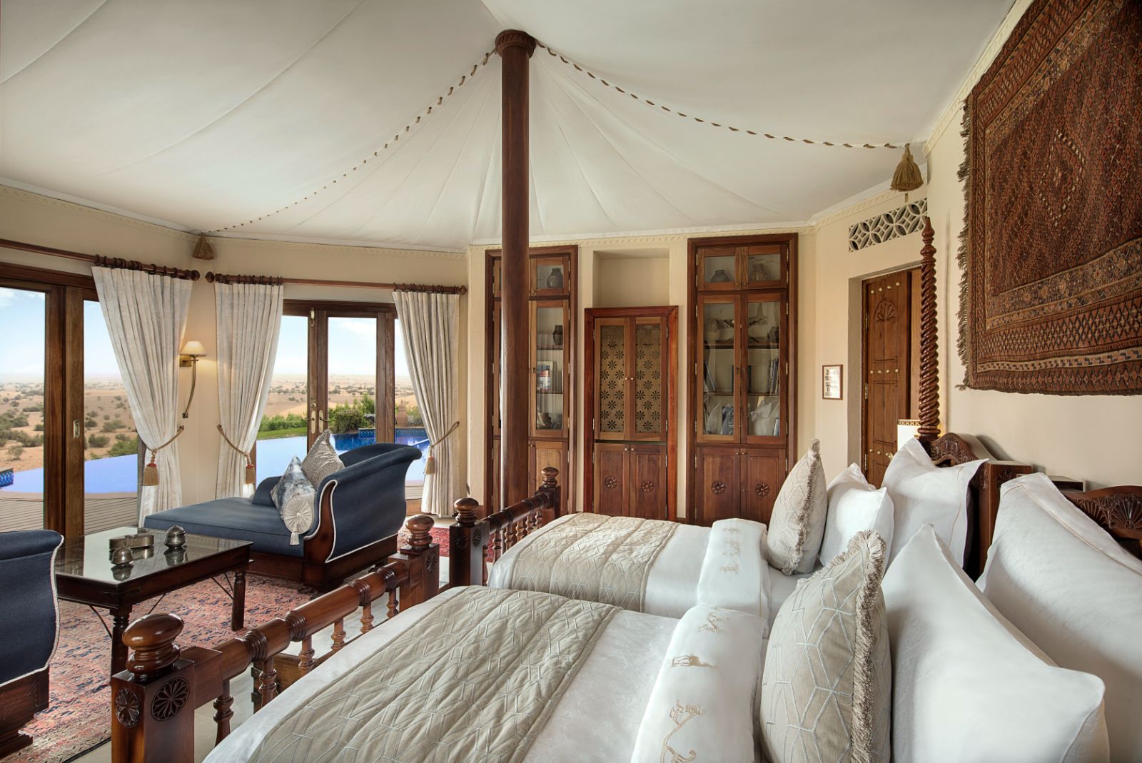 Tented suite bedroom at Al Maha A Luxury Collection Desert Resort & Spa in Dubai