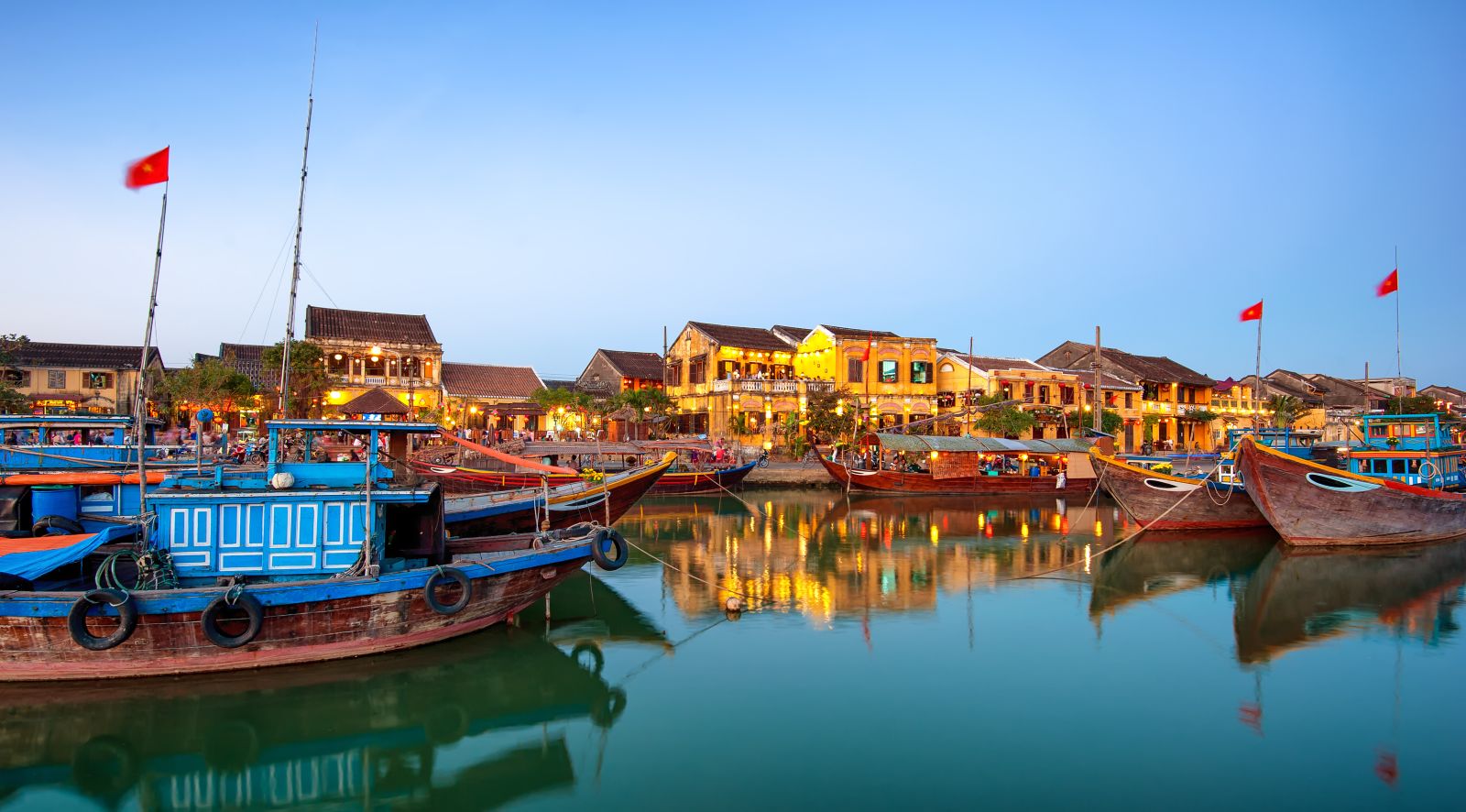 Town and river at dusk in Hoi An Vietnam